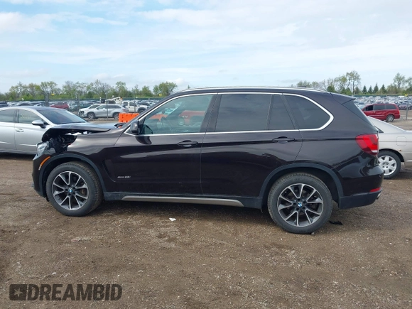 2017 BMW X5 xDrive35i z VIN 5UXKR0C56H0U49957, wystawiony jako IAAI lot #42183768 z przebiegiem 96 346 mil mil oraz . Historia ofert i sprzedaży dostępna na DreamBid. Obrazek 14.