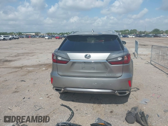 2019 Lexus RX 350 z VIN 2T2ZZMCA3KC123630, wystawiony jako IAAI lot #42436711 z przebiegiem 63 989 mil mil oraz . Historia ofert i sprzedaży dostępna na DreamBid. Obrazek 17.