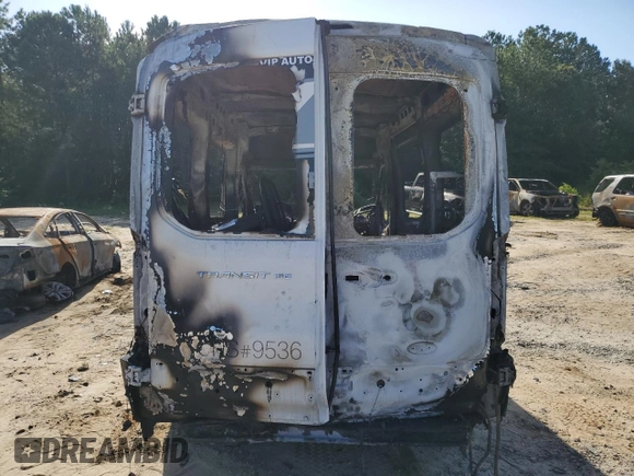 2015 Ford Transit with VIN 1FTNE1CM9FKB05709, listed as a Copart auction lot 59449354 with Not Provided miles and Salvage Title. Bid and sale history available at DreamBid. Image 6.