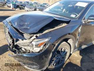 2017 Mazda CX-5 Grand Touring with VIN JM3KFBDL0H0104806, listed as a IAAI auction lot 41621964 with 60,728 mi miles. Bid and sale history available at carsss.com. Image 6.