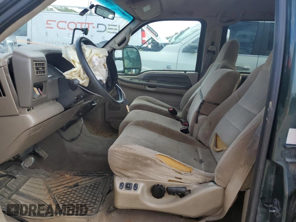 2002 Ford F-250 XL with VIN 1FTNW20F12EA79821, listed as a Copart auction lot 49194604 with 466,631 mi miles and Salvage Title. Bid and sale history available at DreamBid. Image 7.