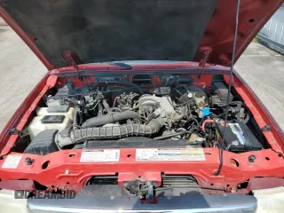 1999 Ford Ranger XL with VIN 1FTYR14V2XPB56627, listed as a Copart auction lot 57036435 with 215,050 mi miles and Salvage title. Bid and sale history available at DreamBid. Image 11.