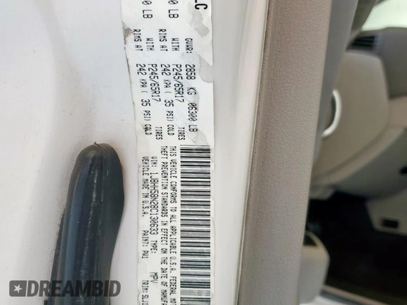 2008 Jeep Commander Limited with VIN 1J8HH58N28C130633, listed as a Copart auction lot 61009065 with 206,121 mi miles and Salvage title. Bid and sale history available at DreamBid. Image 13.