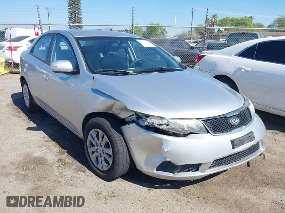 2010 Kia Forte EX with VIN KNAFU4A2XA5097831, listed as a IAAI auction lot 41872156 with 168,081 mi miles. Bid and sale history available at carsss.com. Image 1.