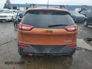 2014 Jeep Cherokee Trailhawk with VIN 1C4PJMBB4EW317799, listed as a Copart auction lot 46779095 with 95,832 mi miles and Clean Title. Bid and sale history available at carsss.com. Image 6.