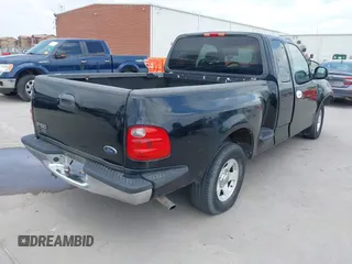 2002 Ford F-150 XL z VIN 1FTRX07W12KD47521, wystawiony jako IAAI lot #42044623 z przebiegiem 334 930 mil mil oraz . Historia ofert i sprzedaży dostępna na DreamBid. Obrazek 4.