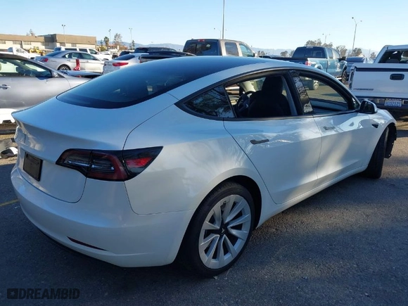 2023 Tesla Model 3 with VIN 5YJ3E1EA4PF421933, listed as a IAAI auction lot 41369120 with 21,914 mi miles. Bid and sale history available at carsss.com. Image 4.
