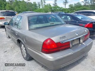 2003 Mercury Grand Marquis LS Premium z VIN 2MEFM75WX3X683205, wystawiony jako IAAI lot #42177139 z przebiegiem 200 521 mil mil oraz . Historia ofert i sprzedaży dostępna na DreamBid. Obrazek 3.