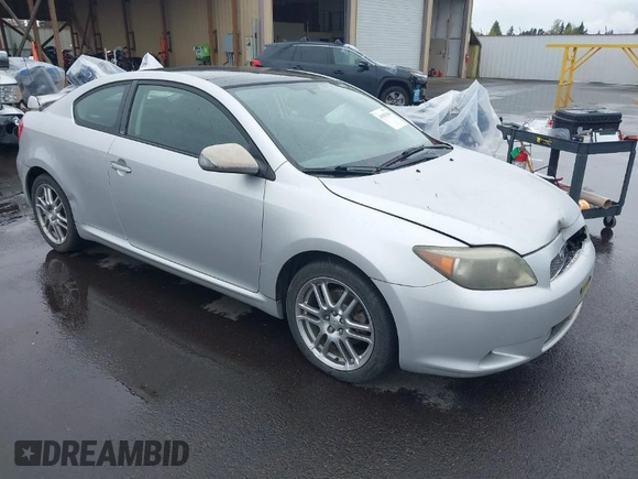 2006 Scion tC with VIN JTKDE177460073448, listed as a IAAI auction lot 41985364 with 170,640 mi miles. Bid and sale history available at carsss.com. Image 1.