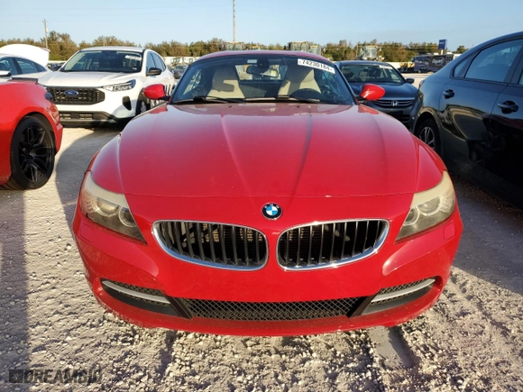 2010 BMW Z4 sDrive30i with VIN WBALM5C55AE377253, listed as a Copart auction lot 74230184 with 0 mi miles and Salvage Title. Bid and sale history available at carsss.com. Image 5.