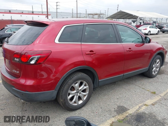 2015 Mazda CX-9 Touring with VIN JM3TB2CV5F0458675, listed as a IAAI auction lot 42047786 with 120,890 mi miles and . Bid and sale history available at carsss.com. Image 4.