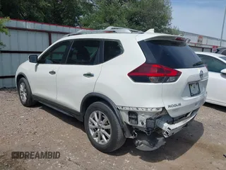 2019 Nissan Rogue SV with VIN KNMAT2MT2KP543145, listed as a IAAI auction lot 42253879 with 100,814 mi miles and . Bid and sale history available at DreamBid. Image 3.
