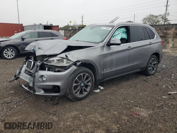 2017 BMW X5 sDrive35i with VIN 5UXKR2C36H0X04777, listed as a Copart auction lot 87718635 with 0 mi miles and Salvage Title. Bid and sale history available at carsss.com. Image 1.