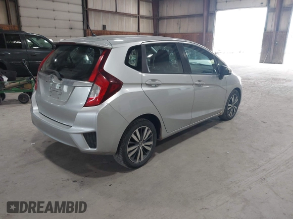 2015 Honda Fit EX-L z VIN 3HGGK5H86FM714030, wystawiony jako IAAI lot #42388380 z przebiegiem 197 414 mil mil oraz . Historia ofert i sprzedaży dostępna na DreamBid. Obrazek 4.
