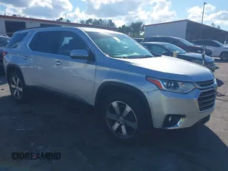2020 Chevrolet Traverse LT with VIN 1GNERHKW1LJ245617, listed as a IAAI auction lot 41662314 with 71,484 mi miles and . Bid and sale history available at DreamBid. Image 1.