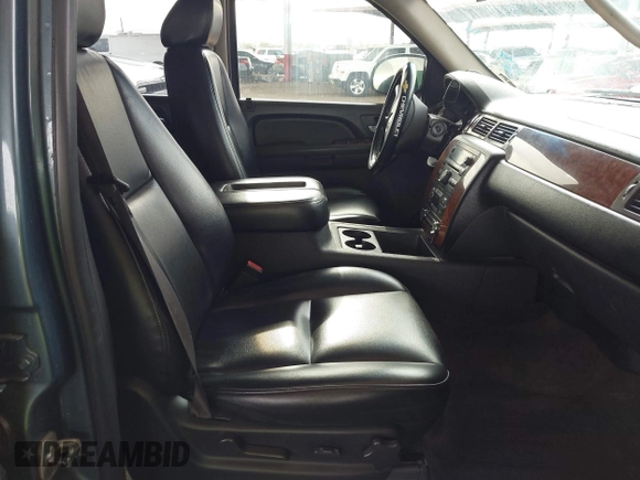 2009 Chevrolet Tahoe 2LT z VIN 1GNFK23069R293642, wystawiony jako IAAI lot #41584582 z przebiegiem 140 633 mil mil oraz . Historia ofert i sprzedaży dostępna na DreamBid. Obrazek 5.
