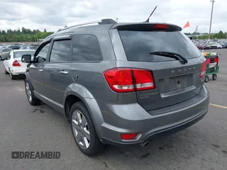 2012 Dodge Journey Crew with VIN 3C4PDDDG4CT213848, listed as a IAAI auction lot 42228688 with 143,406 mi miles and . Bid and sale history available at DreamBid. Image 3.