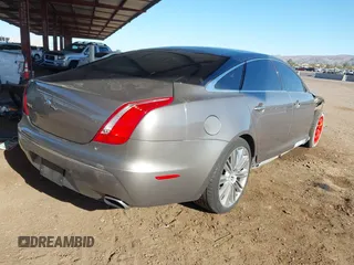 2011 Jaguar XJ XJL with VIN SAJWA2GB0BLV13469, listed as a IAAI auction lot 41836620 with 115,924 mi miles and . Bid and sale history available at DreamBid. Image 4.