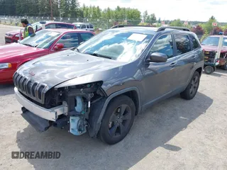 2016 Jeep Cherokee Latitude z VIN 1C4PJMCB9GW293047, wystawiony jako IAAI lot #42325392 z przebiegiem 127 706 mil mil oraz . Historia ofert i sprzedaży dostępna na DreamBid. Obrazek 2.