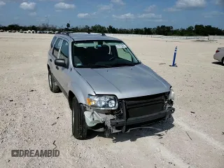 2007 Ford Escape XLS with VIN 1FMYU02Z87KB60530, listed as a Copart auction lot 61273345 with 57,574 mi miles and Salvage title. Bid and sale history available at DreamBid. Image 14.
