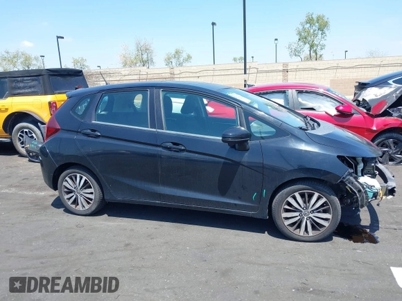2015 Honda Fit EX-L with VIN 3HGGK5H85FM771741, listed as a IAAI auction lot 42095869 with 91,854 mi miles and . Bid and sale history available at DreamBid. Image 14.