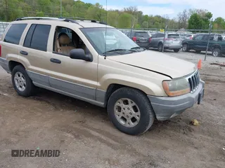 2000 Jeep Grand Cherokee Laredo z VIN 1J4GW48SXYC100248, wystawiony jako IAAI lot #42182318 z przebiegiem 227 658 mil mil oraz . Historia ofert i sprzedaży dostępna na DreamBid. Obrazek 1.