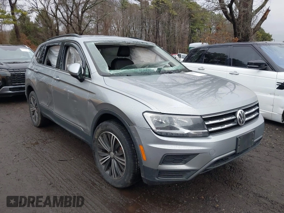 2021 Volkswagen Tiguan SE with VIN 3VV2B7AX8MM100651, listed as a IAAI auction lot 41803931 with 69,405 mi miles and . Bid and sale history available at DreamBid. Image 1.