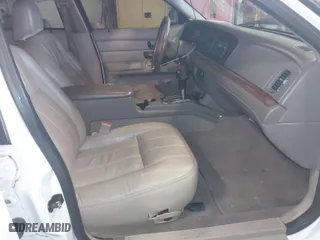 2004 Ford Crown Victoria LX with VIN 2FAFP74W14X110484, listed as a IAAI auction lot 41736140 with 220,067 mi miles. Bid and sale history available at carsss.com. Image 5.