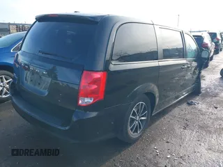 2019 Dodge Grand Caravan SE with VIN 2C4RDGBGXKR528085, listed as a IAAI auction lot 41946407 with 166,854 mi miles and . Bid and sale history available at DreamBid. Image 4.