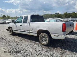 1994 GMC Sierra 1500 with VIN 1GTEC19KXRE557960, listed as a Copart auction lot 71677974 with 194,641 mi miles and Salvage Title. Bid and sale history available at DreamBid. Image 2.