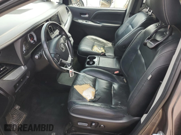 2016 Toyota Sienna SE z VIN 5TDXK3DC4GS720388, wystawiony jako Copart lot #60211685 z przebiegiem 191 729 mil mil oraz Szkoda całkowita • Salvage title. Historia ofert i sprzedaży dostępna na DreamBid. Obrazek 7.