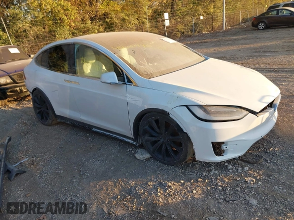 2017 Tesla Model X 90D z VIN 5YJXCBE20HF050017, wystawiony jako IAAI lot #41145641 z przebiegiem Nie podano mil oraz . Historia ofert i sprzedaży dostępna na DreamBid. Obrazek 1.