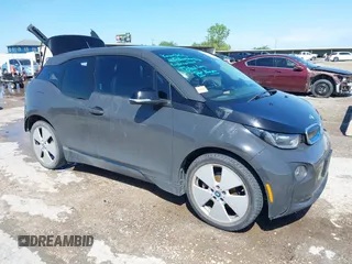 2015 BMW i3 z VIN WBY1Z2C50FV287637, wystawiony jako IAAI lot #42077747 z przebiegiem 67 283 mil mil oraz . Historia ofert i sprzedaży dostępna na DreamBid. Obrazek 1.