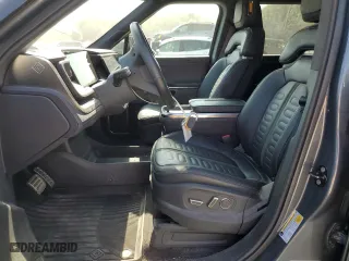 2022 Rivian R1T Adventure Package with VIN 7FCTGAAA7NN015041, listed as a Copart auction lot 70955194 with 45,469 mi miles and Salvage Title. Bid and sale history available at carsss.com. Image 7.