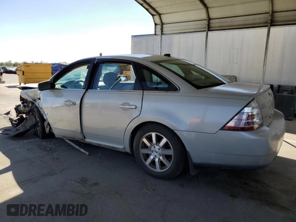 2008 Ford Taurus SEL with VIN 1FAHP24W08G124304, listed as a Copart auction lot 70812324 with 197,507 mi miles and Salvage Title. Bid and sale history available at carsss.com. Image 2.