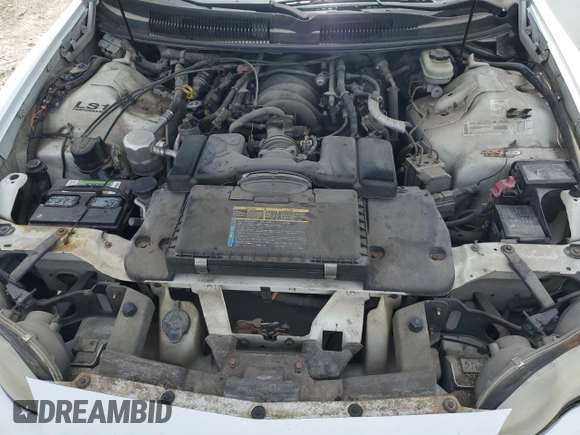 1999 Chevrolet Camaro Z28 z VIN 2G1FP22G1X2122217, wystawiony jako Copart lot #54150045 z przebiegiem 288 219 mil mil oraz Szkoda całkowita • Salvage title. Historia ofert i sprzedaży dostępna na DreamBid. Obrazek 11.