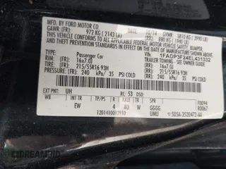2014 Ford Focus SE with VIN 1FADP3F24EL431332, listed as a IAAI auction lot 42135538 with 121,362 mi miles. Bid and sale history available at carsss.com. Image 9.