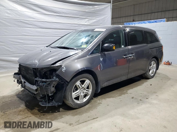 2013 Honda Odyssey Touring with VIN 5FNRL5H91DB024040, listed as a Copart auction lot 57241615 with 163,788 mi miles and Salvage title. Bid and sale history available at DreamBid. Image 1.