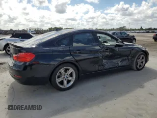 2015 BMW 4 Series 428i with VIN WBA4A5C55FD410360, listed as a Copart auction lot 44335485 with 144,997 mi miles and Salvage Title. Bid and sale history available at DreamBid. Image 3.
