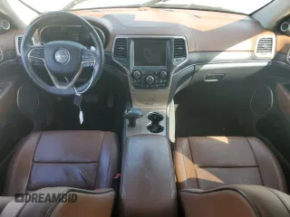 2015 Jeep Grand Cherokee Summit with VIN 1C4RJFJG3FC847797, listed as a Copart auction lot 54848085 with 53,506 mi miles and Salvage Title. Bid and sale history available at DreamBid. Image 8.
