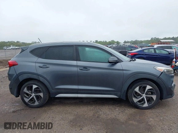 2017 Hyundai Tucson Value z VIN KM8J33A28HU399978, wystawiony jako IAAI lot #41987370 z przebiegiem 96 958 mil mil oraz . Historia ofert i sprzedaży dostępna na DreamBid. Obrazek 14.