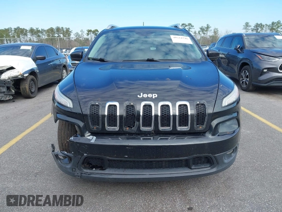2014 Jeep Cherokee Latitude with VIN 1C4PJLCB0EW288309, listed as a IAAI auction lot 41624746 with 164,037 mi miles and . Bid and sale history available at DreamBid. Image 12.