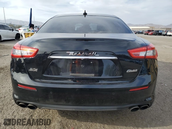 2018 Maserati Ghibli S Q4 z VIN ZAM57YTA4J1296684, wystawiony jako Copart lot #51278825 z przebiegiem 59 872 mil mil oraz Szkoda całkowita • Salvage title. Historia ofert i sprzedaży dostępna na DreamBid. Obrazek 6.