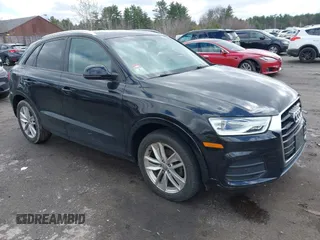 2017 Audi Q3 Premium z VIN WA1ECCFS4HR009874, wystawiony jako IAAI lot #41983904 z przebiegiem 74 785 mil mil oraz . Historia ofert i sprzedaży dostępna na DreamBid. Obrazek 1.