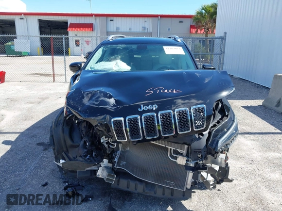 2019 Jeep Cherokee Limited z VIN 1C4PJLDX5KD487535, wystawiony jako IAAI lot #42263873 z przebiegiem 51 345 mil mil oraz . Historia ofert i sprzedaży dostępna na DreamBid. Obrazek 6.