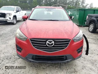 2016 Mazda CX-5 Grand Touring z VIN JM3KE2DY8G0623423, wystawiony jako Copart lot #58599545 z przebiegiem 131 932 mil mil oraz Szkoda całkowita • Salvage title. Historia ofert i sprzedaży dostępna na DreamBid. Obrazek 5.