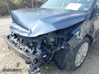 2014 Toyota Avalon Hybrid Limited with VIN 4T1BD1EB5EU024433, listed as a IAAI auction lot 41942865 with 142,377 mi miles. Bid and sale history available at carsss.com. Image 18.
