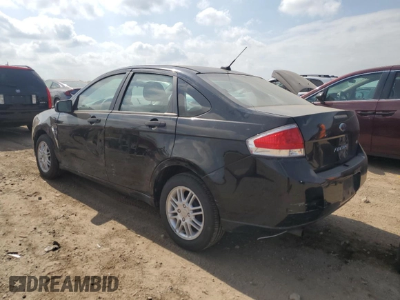 2008 Ford Focus SE z VIN 1FAHP35NX8W215744, wystawiony jako Copart lot #56096055 z przebiegiem 165 827 mil mil oraz Szkoda całkowita • Salvage title. Historia ofert i sprzedaży dostępna na DreamBid. Obrazek 2.