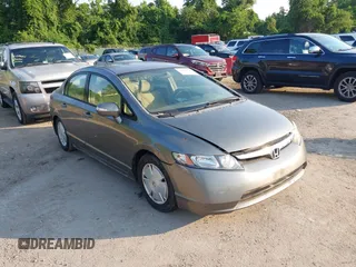 2006 Honda Civic z VIN JHMFA36256S002453, wystawiony jako IAAI lot #42490756 z przebiegiem 179 130 mil mil oraz . Historia ofert i sprzedaży dostępna na DreamBid. Obrazek 1.
