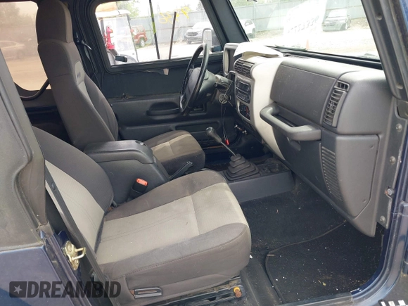 2004 Jeep Wrangler X with VIN 1J4FA39S64P726711, listed as a IAAI auction lot 42227336 with Not Provided miles and . Bid and sale history available at DreamBid. Image 5.